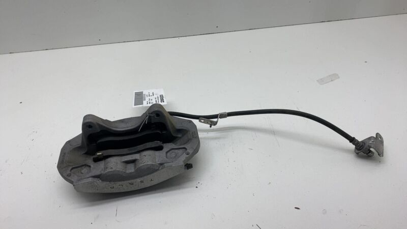 1044621-00-E 17-23 Model 3 Front Driver Side Caliper w/ Brake Hose Line Left LH 1044621-00-E