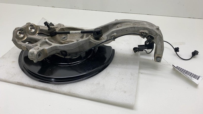 142031100F 2021-2024 Tesla Model S Front Left Spindle Knuckle Hub w/ ABS & Dust Shield AWD