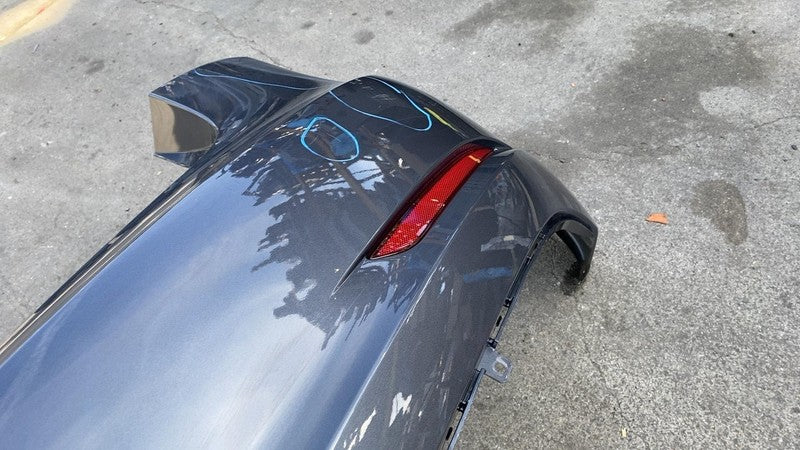 2023 Tesla Model 3 Rear Bumper Cover w/ Light Reflectors Assembly Gray PMNG OEM