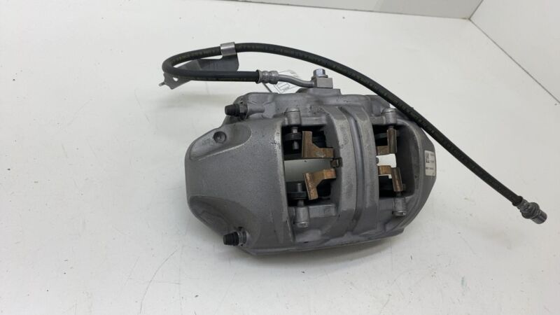 2020-2023 Tesla Model Y MY Front Driver Side Caliper w/ Brake Hose Line Left OEM