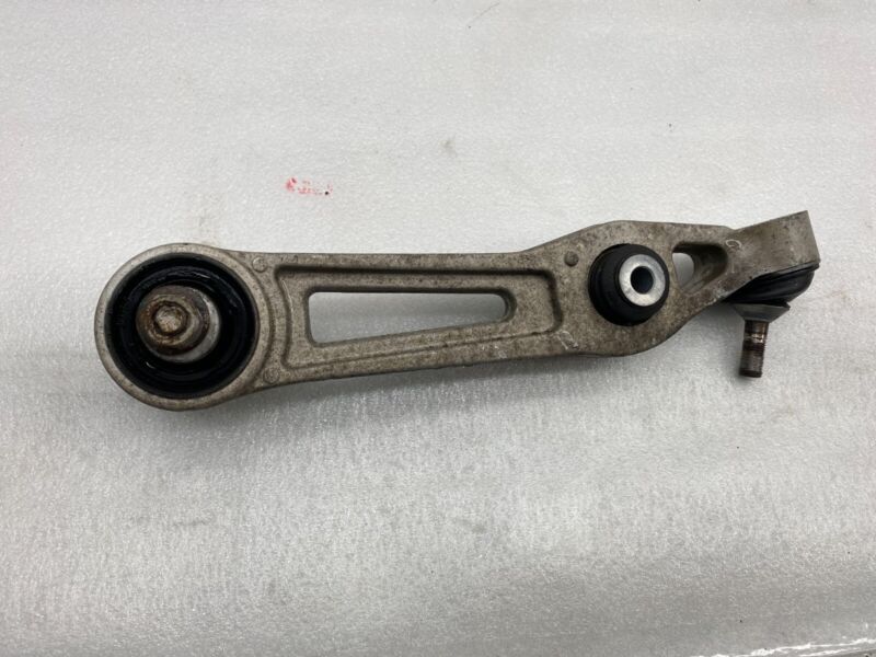 1048951 00 B 2012-2015 Tesla Model S Front Left or Right Lower Control Arm Rearward Assembly