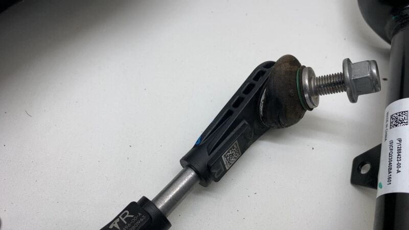1288416-00-A ⭕ 23-24 Model Y Rear Right Knuckle Hub Fore Toe Link Spring RH AWD 1288416-00-A