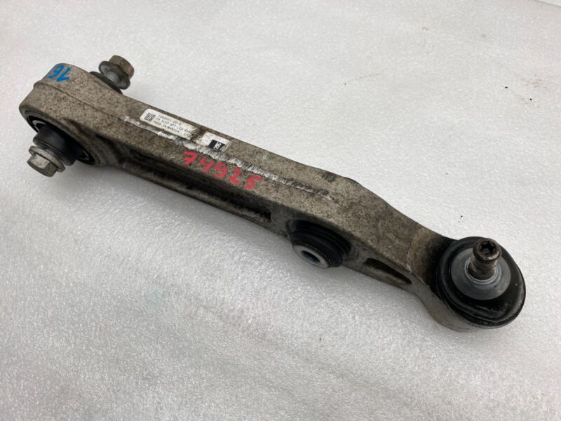 1048951 00 B 2012-2015 Tesla Model S Front Left or Right Lower Control Arm Rearward Assembly