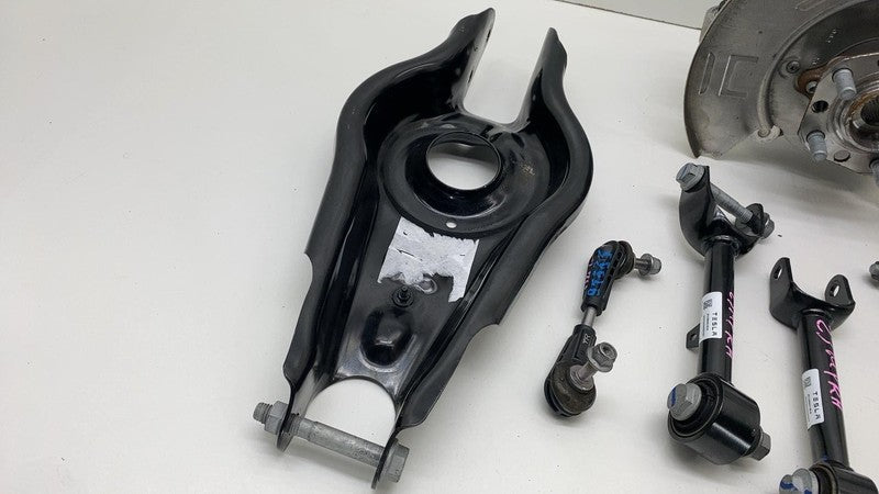 1288416-00-A ⭕ 23-24 Model Y Rear Right Knuckle Hub Fore Toe Link Spring RH AWD 1288416-00-A