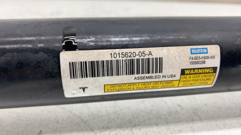 101562005A 2012-2020 Tesla Model S Rear Left = Right Shock Strut Absorber & Coil Spring AWD