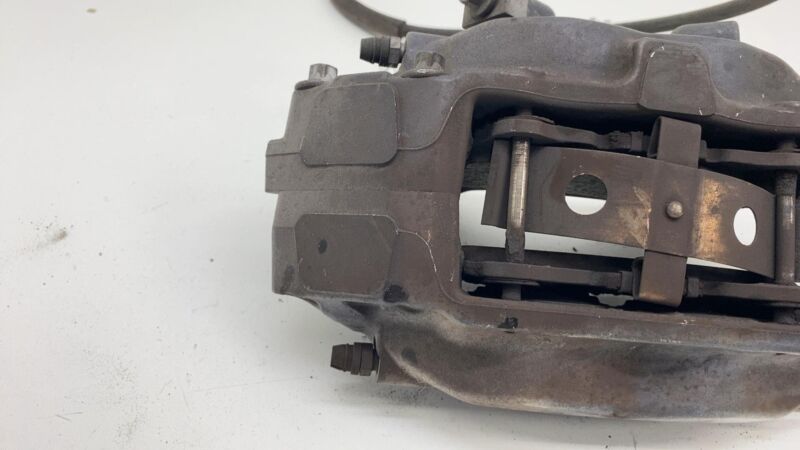 2012-2020 Tesla Model S MS Front Driver Side Caliper w/ Brake Hose Line Left OEM