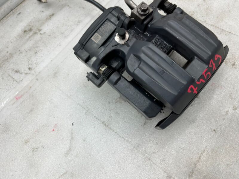 107854100A 2019-2021 Tesla Model S X Rear Driver Side Brake Caliper w/ Hose Line Left Assy