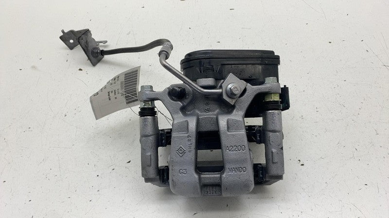 PT00030005-C ⭕ 2024-2025 Rivian R1S Rear Driver Side Caliper w/ Brake Line Left PT00030005-C