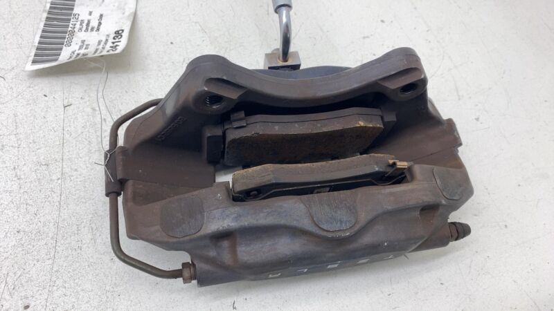 2012-2020 Tesla Model S MS Rear Driver Side Caliper w/ Brake Hose Line Left OEM