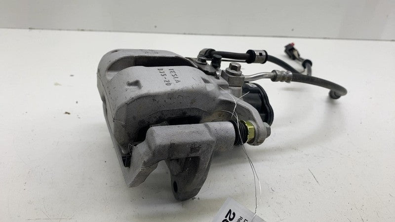 1044623-00-J ⭕ 2017-2025 Tesla Model 3 Rear Left Caliper w/ Brake Line Hose BASE 1044623-00-J