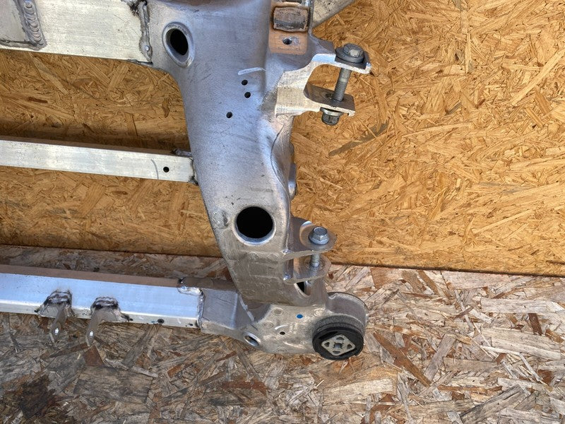 104880200A ⭕ 2016-2020 Tesla Model X Rear Subframe Cradle Crossmember Carrier 1048802-00-A