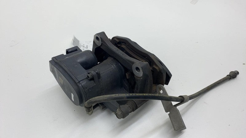 1420641-00-A 2021-2024 Tesla Model S X Rear Driver Side Caliper w/ Brake Hose Line Left Assy