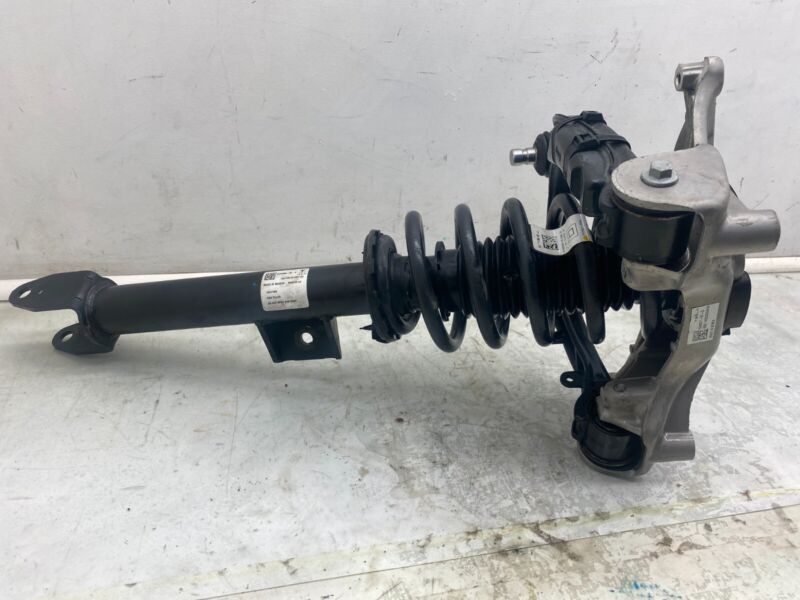 104409000A 17-20 Model 3 Left Shock Absorber w/ Control Arm Mid-Range Btry RWD 1044090-00-A