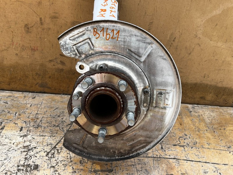 104431600E 17-23 Model 3 Front Right RWD Spindle Knuckle w/ Wheel Hub & Shield 1044316-00-E