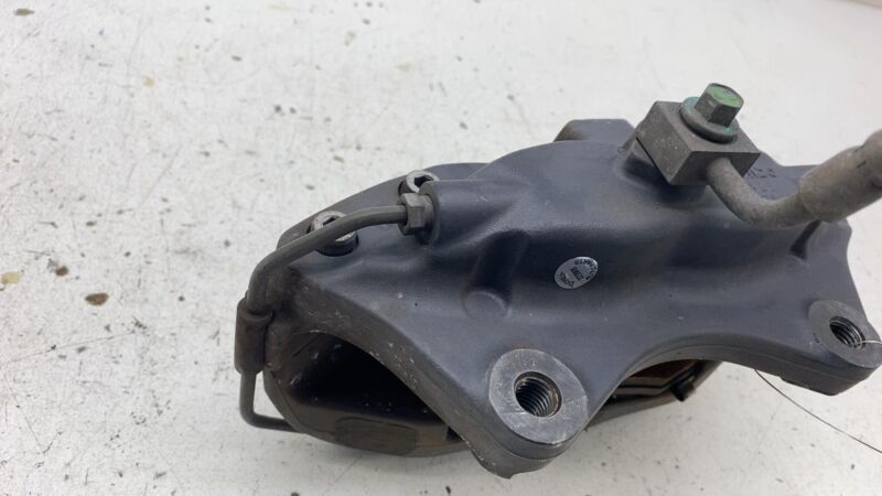 2012-2020 Tesla Model S MS Rear Driver Side Caliper w/ Brake Hose Line Left OEM