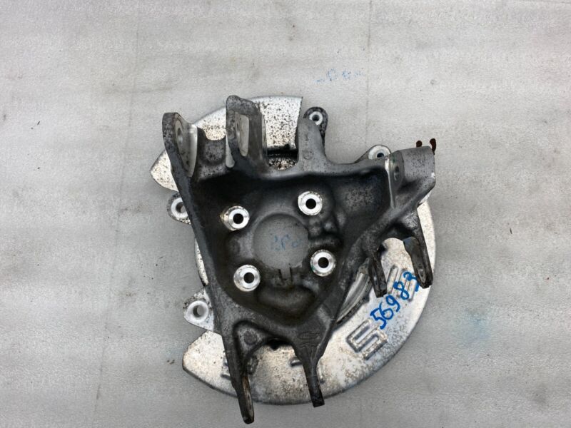 1027411 00 D 2015-2021 Tesla Model X MX Rear Driver Side Suspension Knuckle & Shield Left OEM