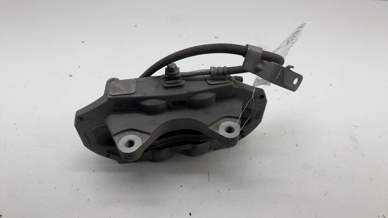 104462100E ⭕ 2017-2023 Tesla Model 3 Front Left Caliper w/ Brake Hose Line LH 1044621-00-E