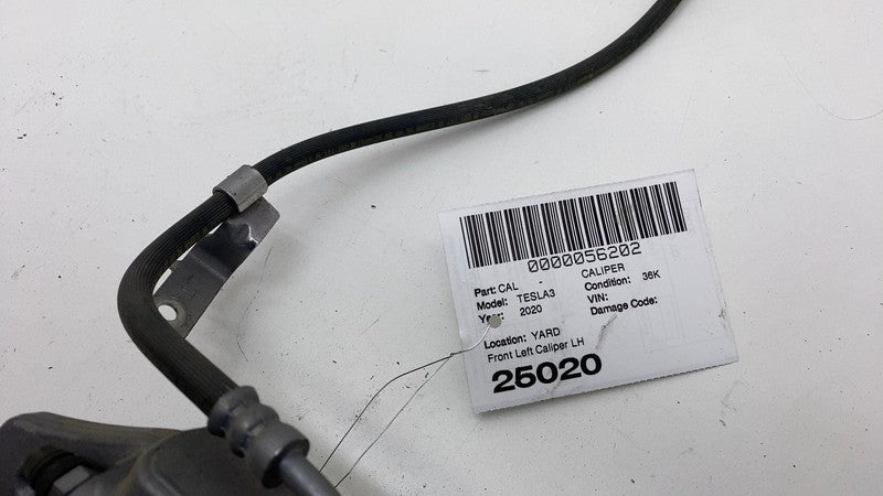 1044621-00-E 17-23 Model 3 Front Driver Side Caliper w/ Brake Hose Line Left LH 1044621-00-E