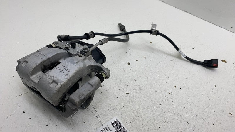 ⭕ 17-25 Tesla Model 3 M3 Rear Left Caliper w/ Brake Hose Line BASE 104