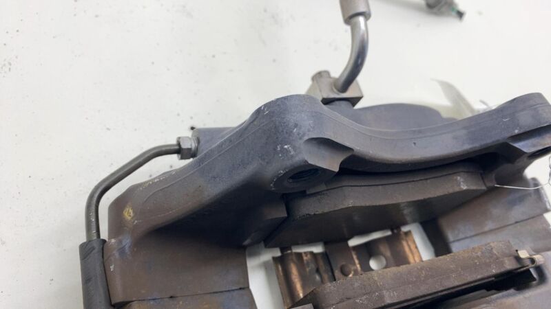 6006434-00-C 2012-2020 Tesla Model S MS Rear Driver Side Caliper w/ Brake Hose Line Left Assy