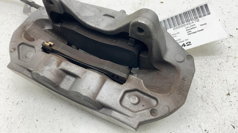 104462200D ⭕ 2017-2023 Tesla Model 3 Front Caliper w/ Brake Hose Line Right 1044622-00-D