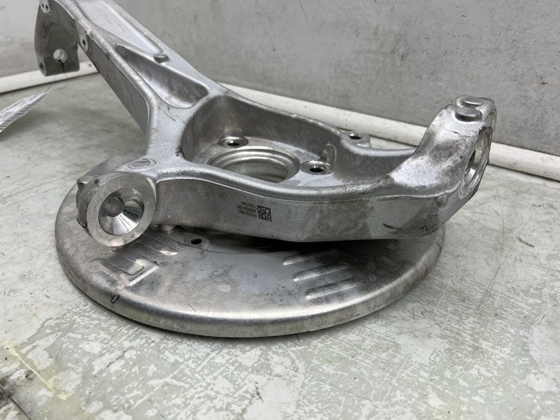 1044316 00 E 2017-2023 Tesla Model 3 Front Passenger Spindle Knuckle Rotor Shield Right RWD