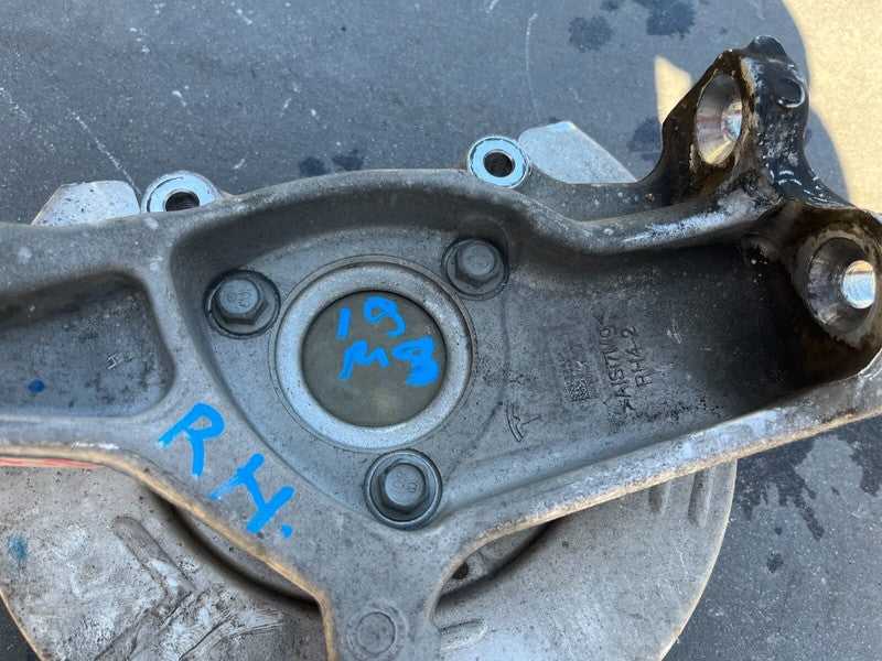 104431600E 17-23 Model 3 Front Right RWD Spindle Knuckle w/ Wheel Hub & Shield 1044316-00-E