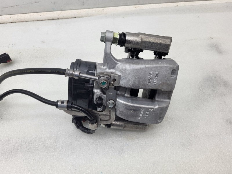 104462300F ⭕ 2017-2025 Tesla Model 3 Rear Left Caliper w/ Brake Line Hose BASE 1044623-00-F