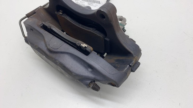 2012-2015 Tesla Model S MS Front Driver Side Caliper w/ Brake Hose Line Left LH