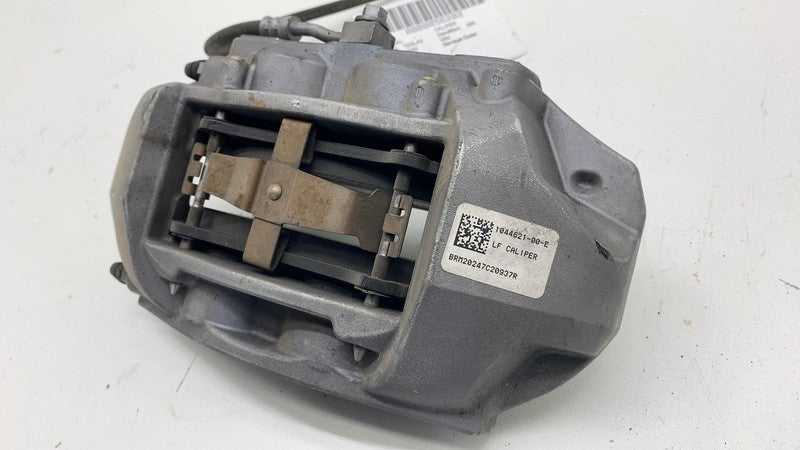1044621-00-E 17-23 Model 3 Front Driver Side Caliper w/ Brake Hose Line Left LH 1044621-00-E