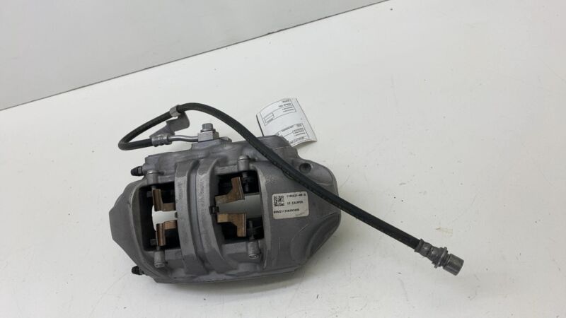 2020-2023 Tesla Model Y MY Front Driver Side Caliper w/ Brake Hose Line Left OEM