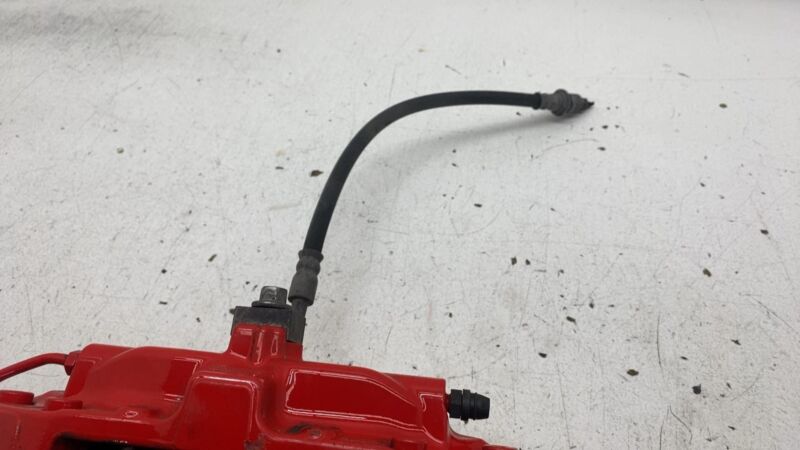 1042642-01-A 2012-2020 Tesla Model S Rear Passenger Side Caliper Red w/ Brake Hose Line Right