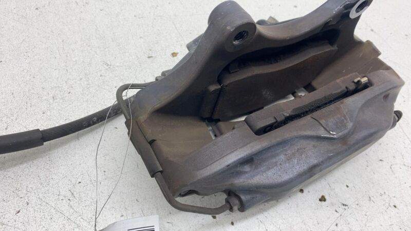 2012-2020 Tesla Model S MS Front Driver Side Caliper w/ Brake Hose Line Left OEM