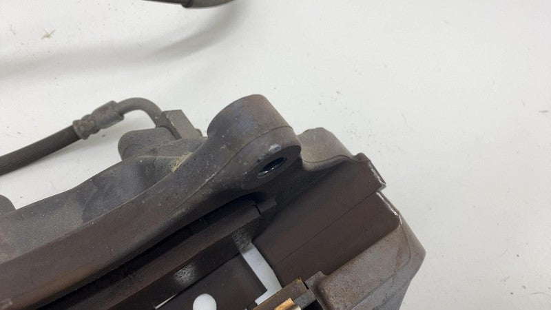 2012-2020 Tesla Model S MS Front Driver Side Caliper w/ Brake Hose Line Left OEM