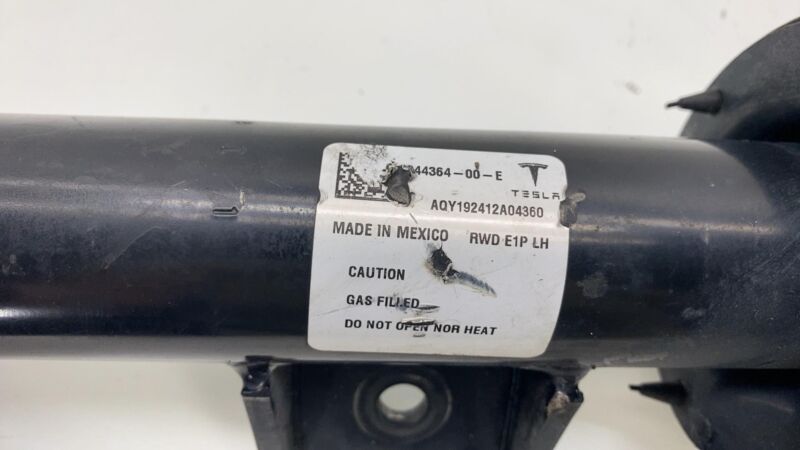 1044379 00 E 17-23 Model 3 Front Left Shock Strut Absorber Damper w/ Coil Spring 1044364-00-E