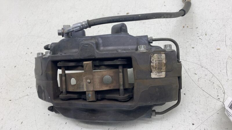 2012-2020 Tesla Model S MS Front Driver Side Caliper w/ Brake Hose Line Left OEM