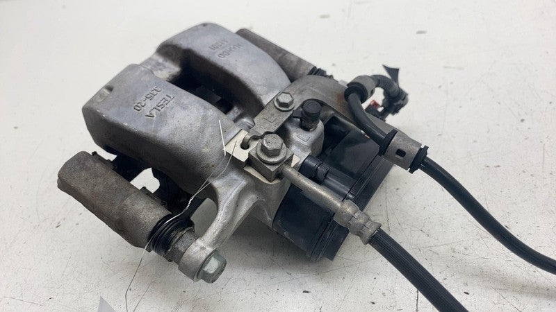 104462300H ⭕ 2017-2025 Tesla Model 3 Rear Left Caliper w/ Brake Line Hose BASE 1044623-00-H