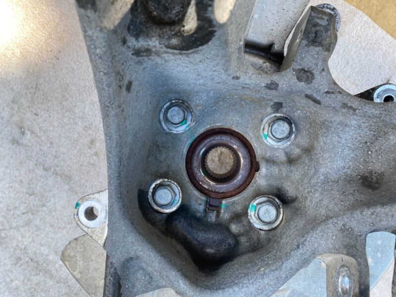 2016-2020 Tesla Model X MX Rear Left Spindle Knuckle w/ Wheel Hub & Dust Shield