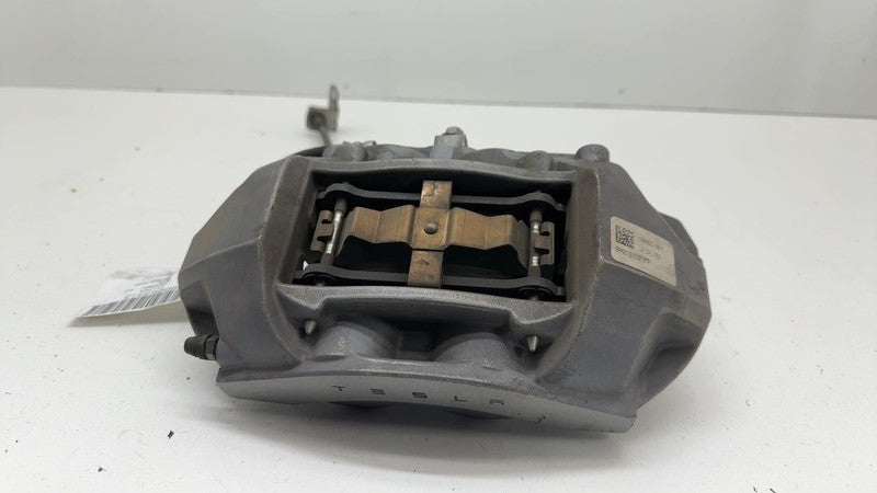 104462100E ⭕ 2017-2023 Tesla Model 3 Front Left Caliper w/ Brake Hose Line LH 1044621-00-E
