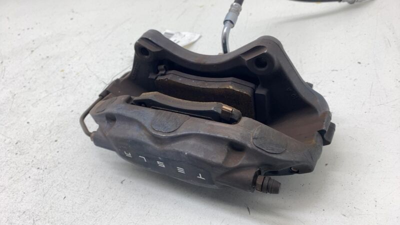 2012-2020 Tesla Model S MS Rear Driver Side Caliper w/ Brake Hose Line Left OEM