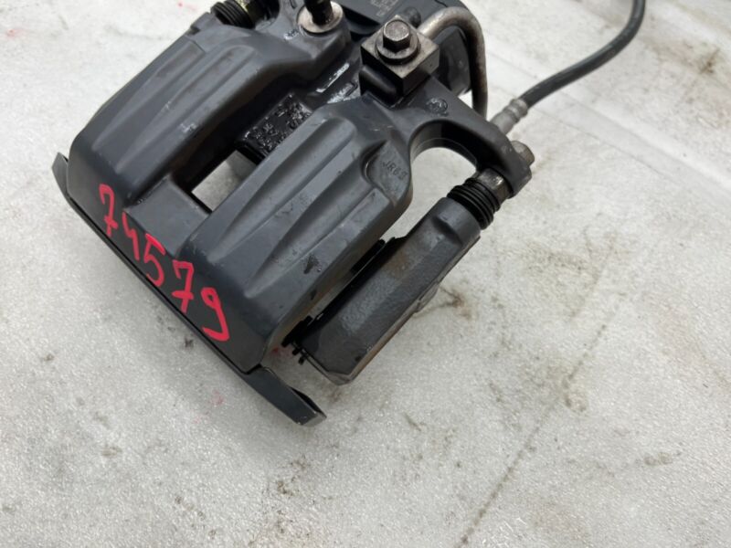 107854100A 2019-2021 Tesla Model S X Rear Driver Side Brake Caliper w/ Hose Line Left Assy