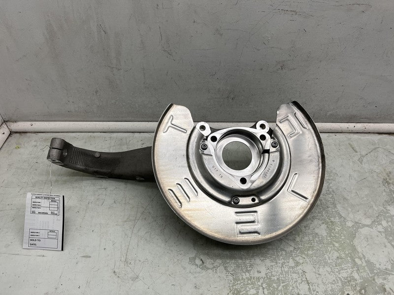 1044661-B 2017-2023 Tesla Model 3 Front Driver Side Spindle Knuckle Rotor Shield Left RWD