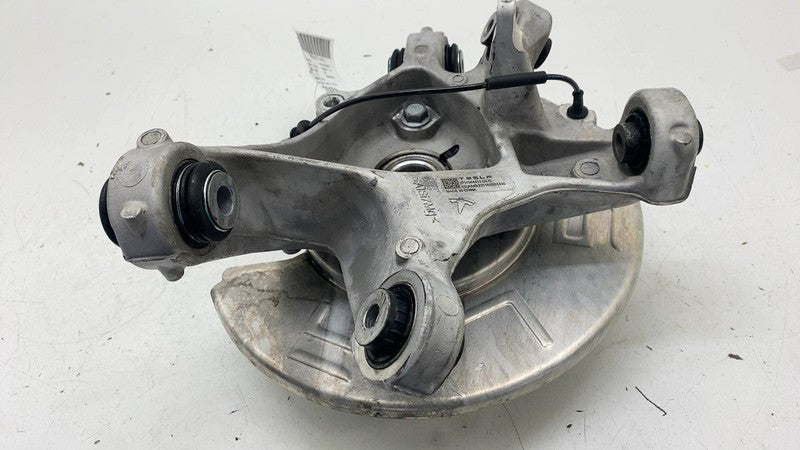104441100G ⭕ 2017-2023 Tesla Model 3 Rear Left Spindle Knuckle w/ Hub & Shield 1044411-00-G