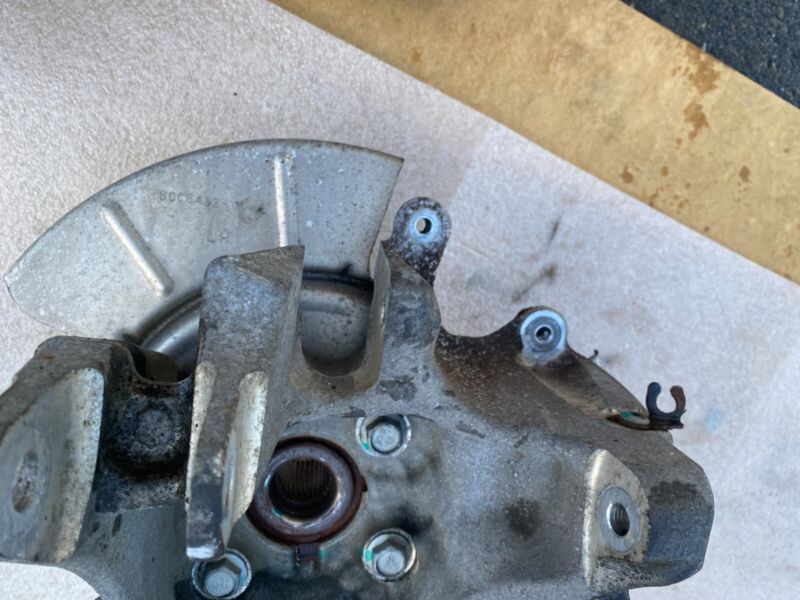 1072160 00 A 2016-2020 Tesla Model X MX Rear Left Spindle Knuckle w/ Wheel Hub & Dust Shield