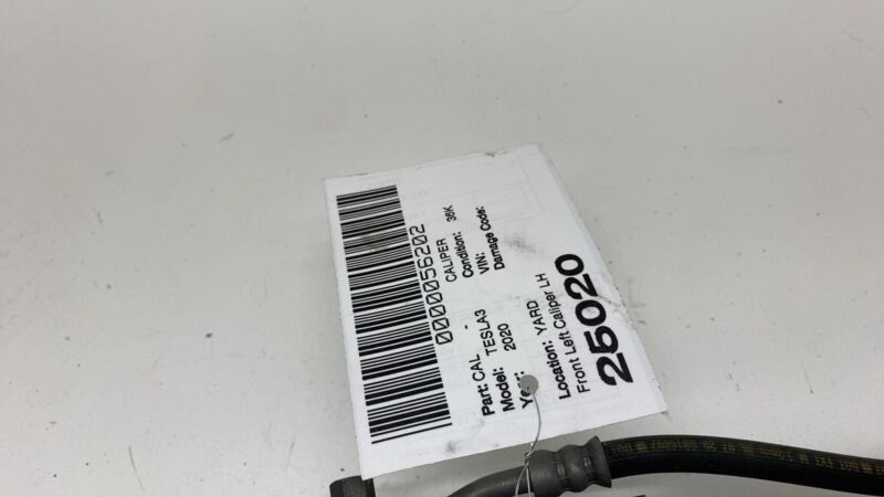 1044621-00-E 17-23 Model 3 Front Driver Side Caliper w/ Brake Hose Line Left LH 1044621-00-E
