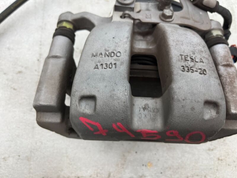 104462400G 2017-2022 Tesla Model 3 Y Rear Passenger Side Caliper w/ Brake Hose Line Right