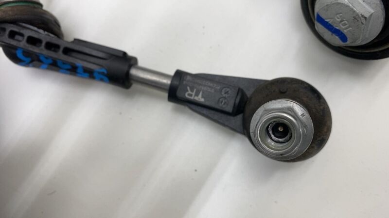 1288416-00-A ⭕ 23-24 Model Y Rear Right Knuckle Hub Fore Toe Link Spring RH AWD 1288416-00-A