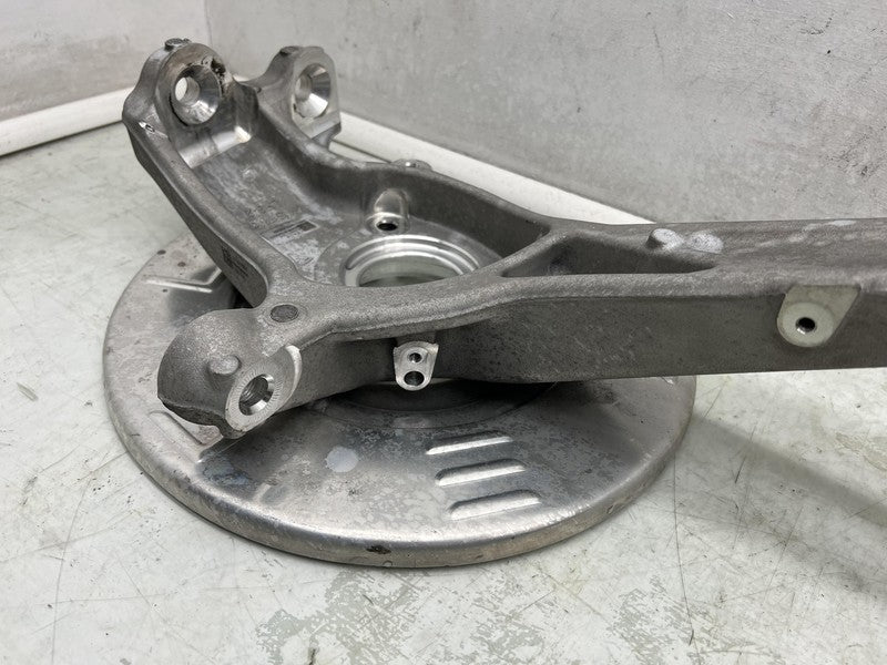 1044661-B 2017-2023 Tesla Model 3 Front Driver Side Spindle Knuckle Rotor Shield Left RWD