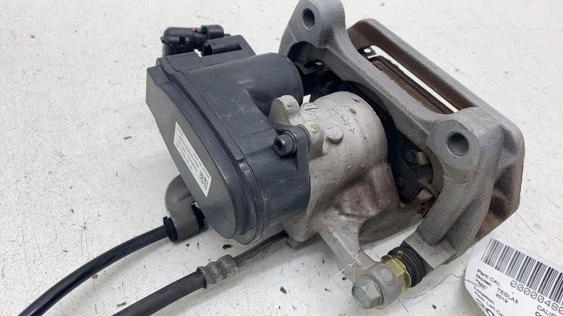 104462300H ⭕ 2017-2025 Tesla Model 3 Rear Left Caliper w/ Brake Line Hose BASE 1044623-00-H