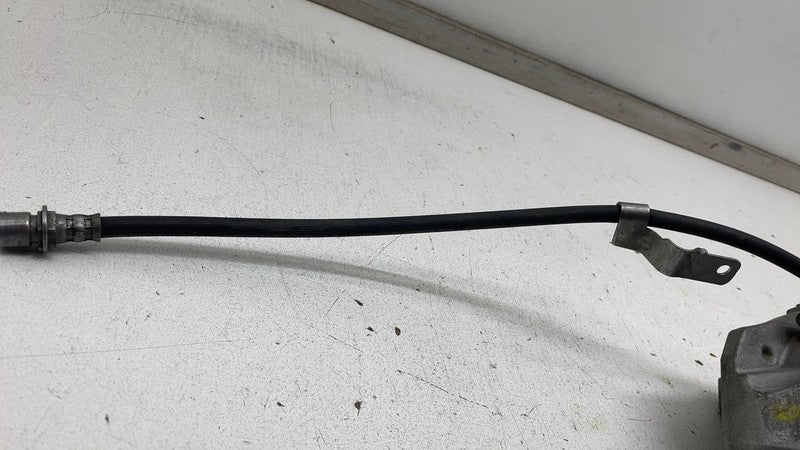 104462100E ⭕ 2017-2023 Tesla Model 3 M3 Front Left Caliper w/ Brake Hose Line 1044621-00-E